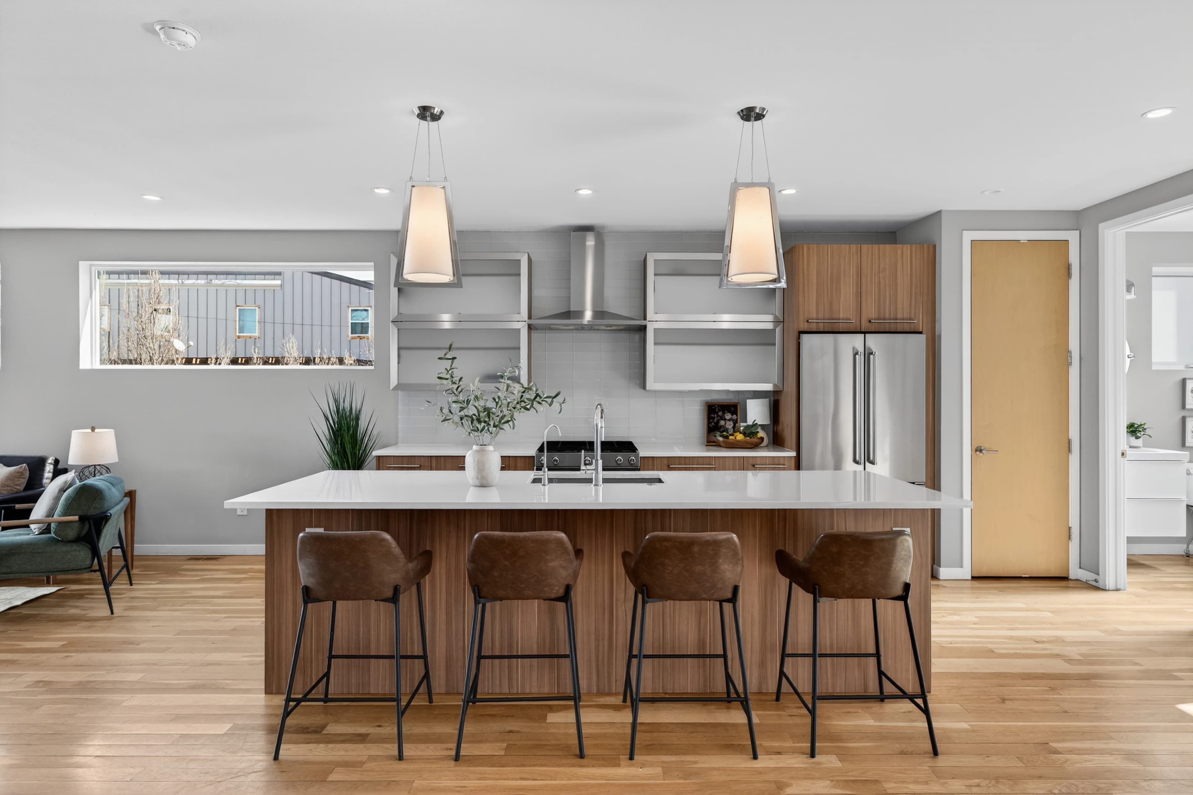 Chef’s kitchen with quartz counters and oversized island.